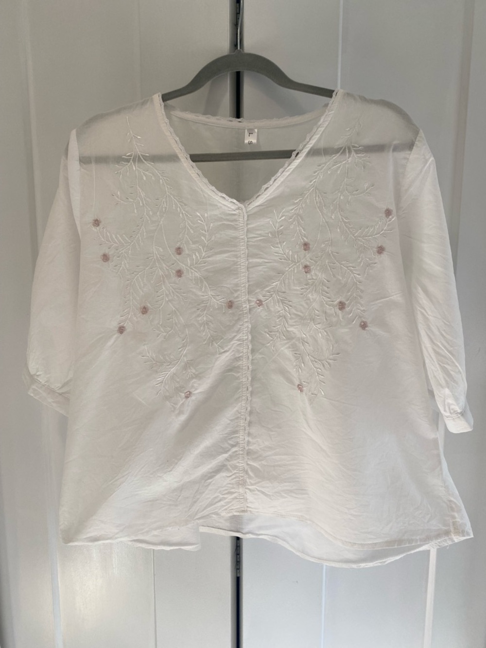 White Embroidered V-Neck Women’s Top